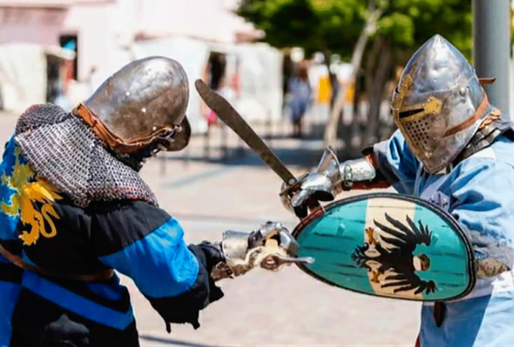 Este domingo 7 de junio, el Club 17 de Octubre (Culpina 1057) rompe la rutina del barrio y se transforma en un campo de batalla. El plato fuerte de la jornada será un torneo crudo de Combate Medieval en modalidad 3 contra 3: peleas de contacto real con armaduras históricas a metros de distancia.