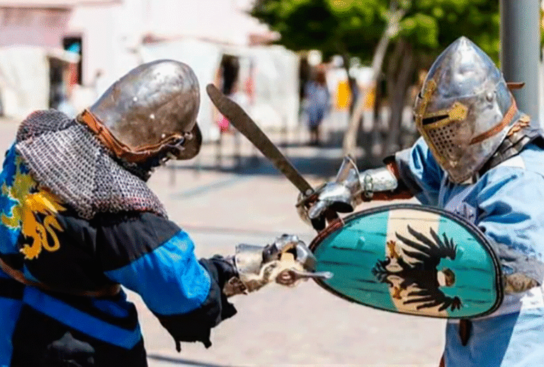 Este domingo 7 de junio, el Club 17 de Octubre (Culpina 1057) rompe la rutina del barrio y se transforma en un campo de batalla. El plato fuerte de la jornada será un torneo crudo de Combate Medieval en modalidad 3 contra 3: peleas de contacto real con armaduras históricas a metros de distancia.